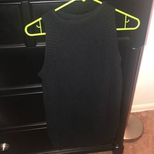 Black sleeveless turtleneck